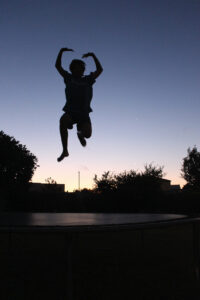 Jumping on the trampoline