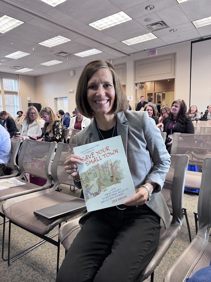 attendee from Illinois holding Debs Book 