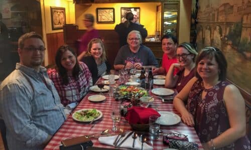 people having dinner together