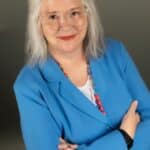 Deb's headshot dressed in blue