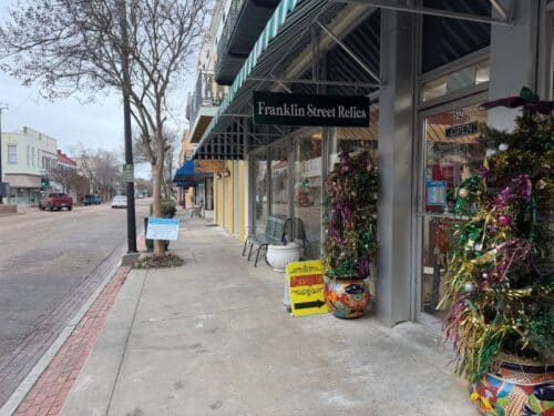 outside view of Franklin Relics in Natchez MS decorated for Mardi Gras