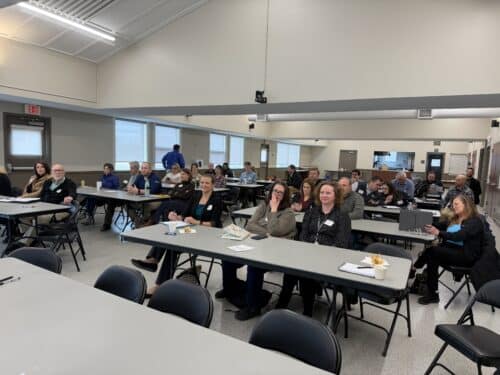 room full of attendees at the East Range Annual Meeting 