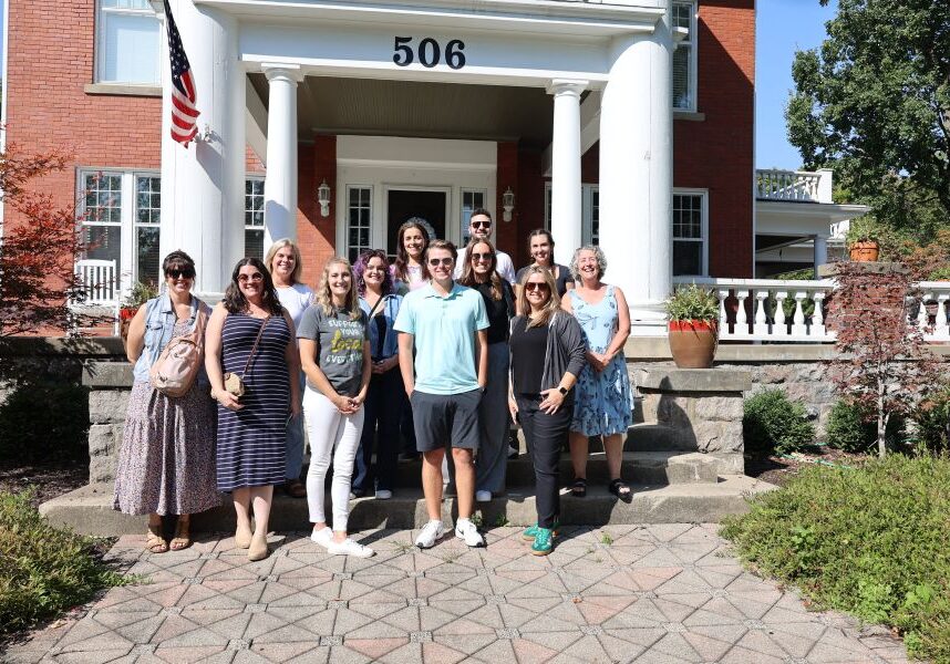 content creators in front of historic building